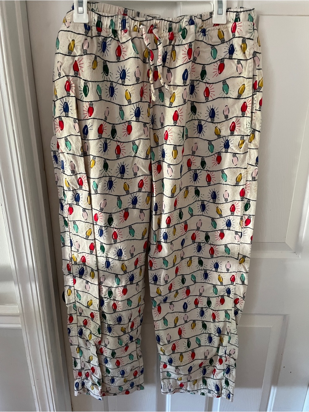 Hanna Andersson Cream Pajama Pants with Red, Blue, Yellow & Green Light Print